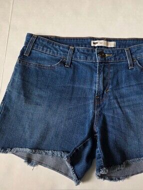 Levi's Medium Blue Denim Jeans with Red Brand Tab, Size 12, Used.